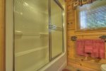 Main Floor Bathroom with a Tub Shower Combo